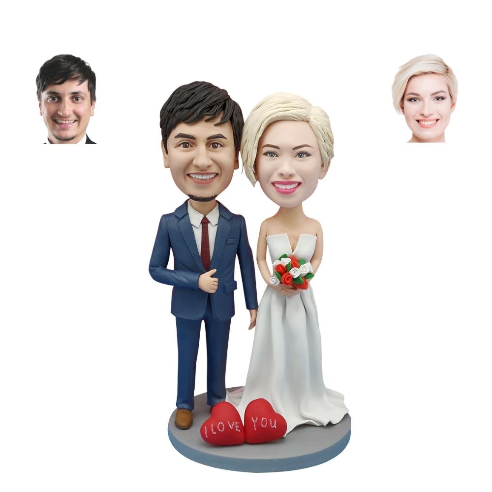 Couple custom bobbleheads with flowers