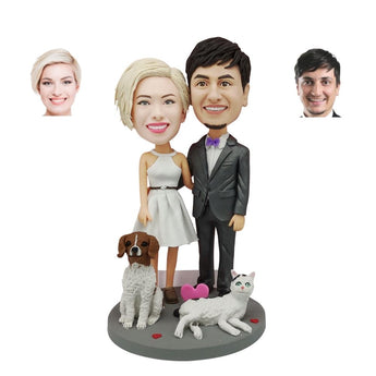 Couple custom bobbleheads with pets